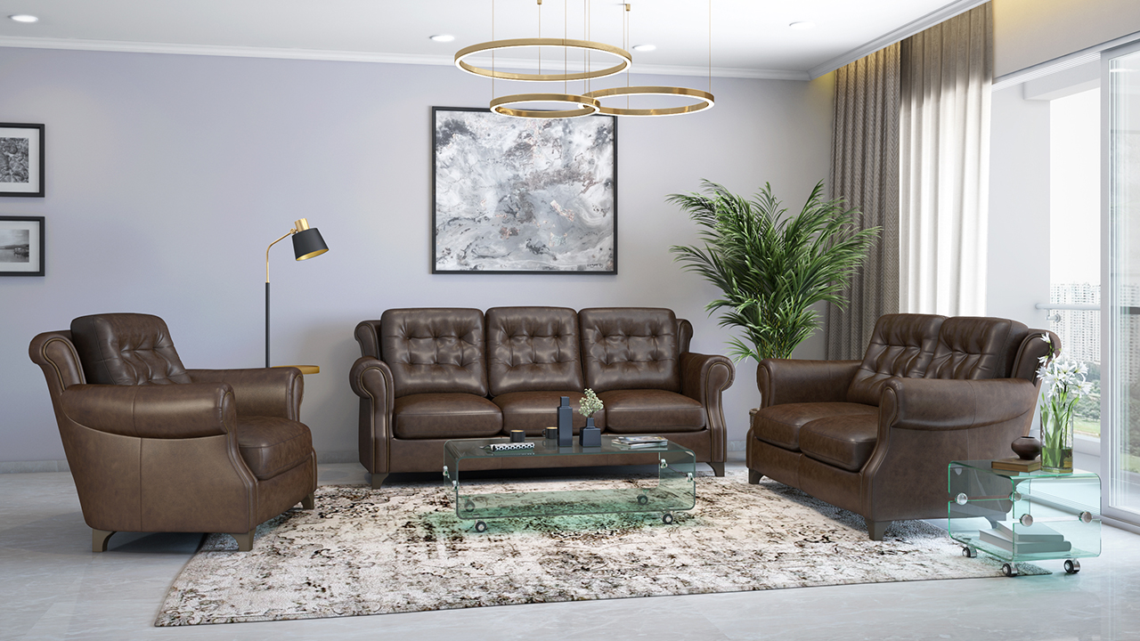 brown colored sofa set in a room